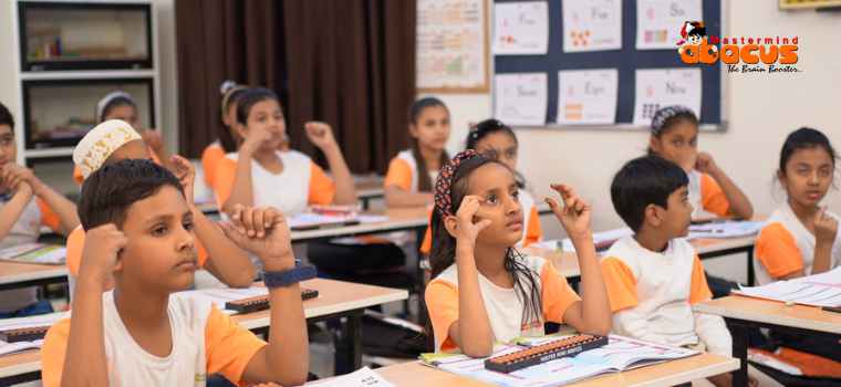 Students learning Abacus math in Classroom